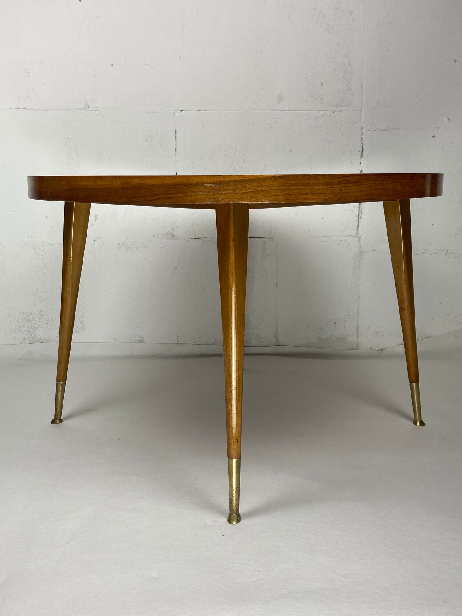 Italian round table with tapered brass leg ends, 1950s