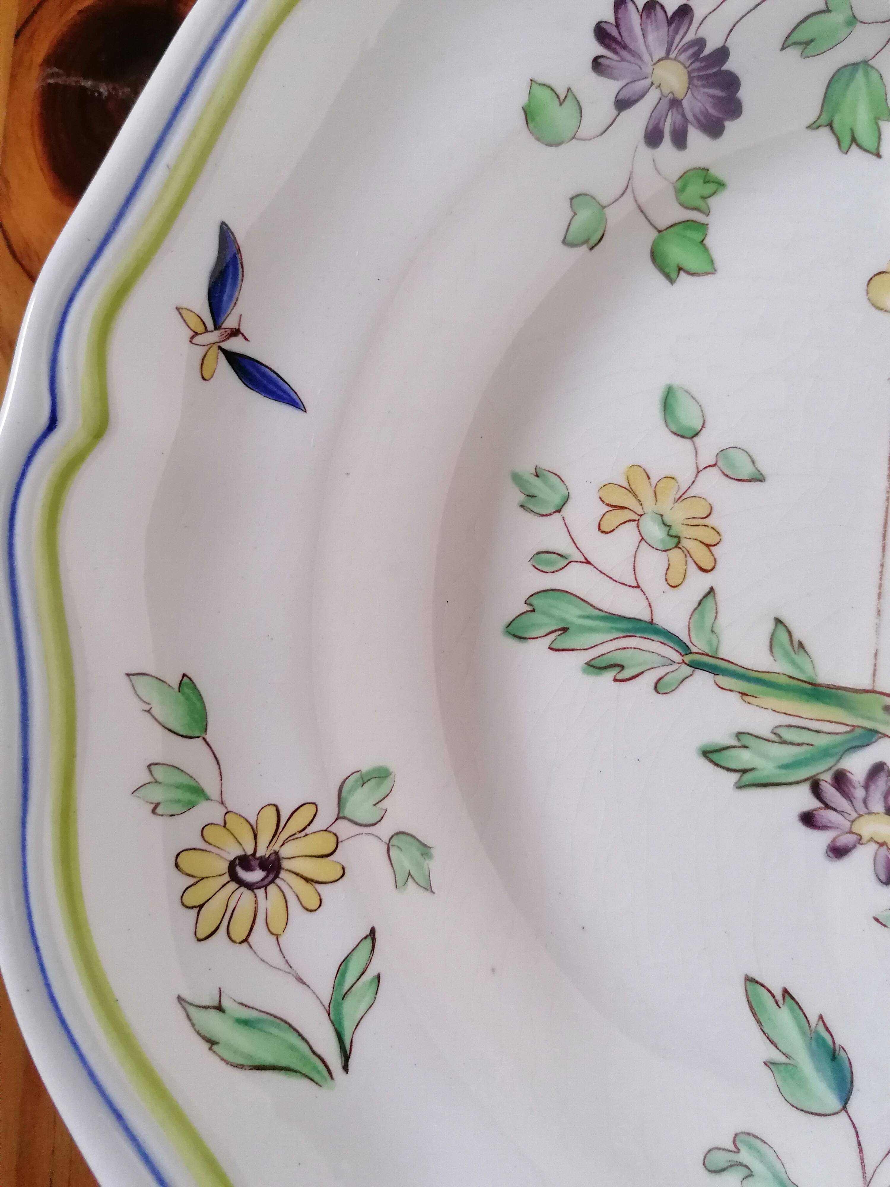 Assiette en faïence de Longchamps décor pèlerin