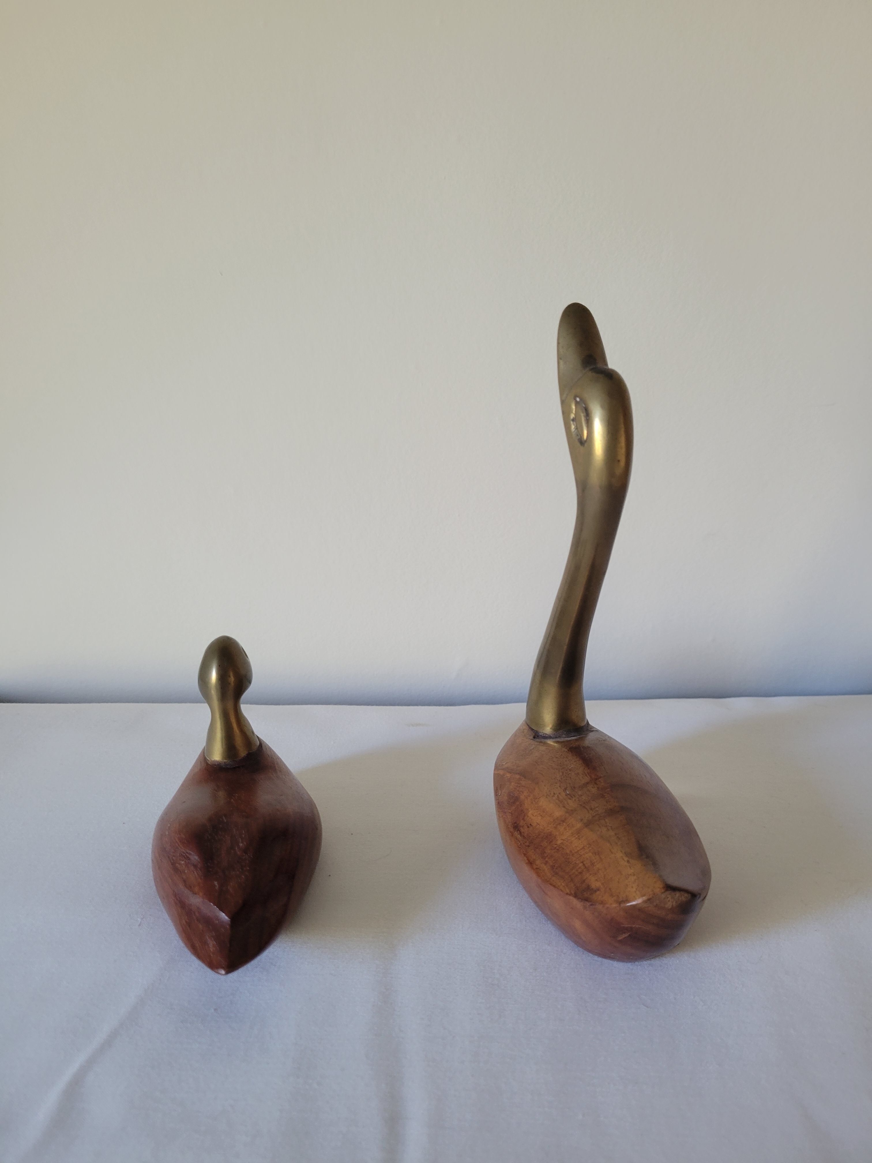 Duck and swan in brass and wood