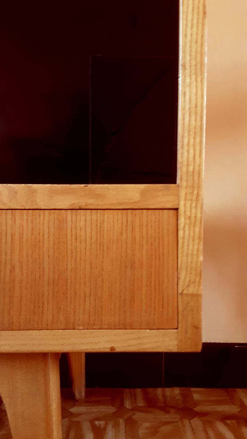 Sideboard in a row by Charles Ramos