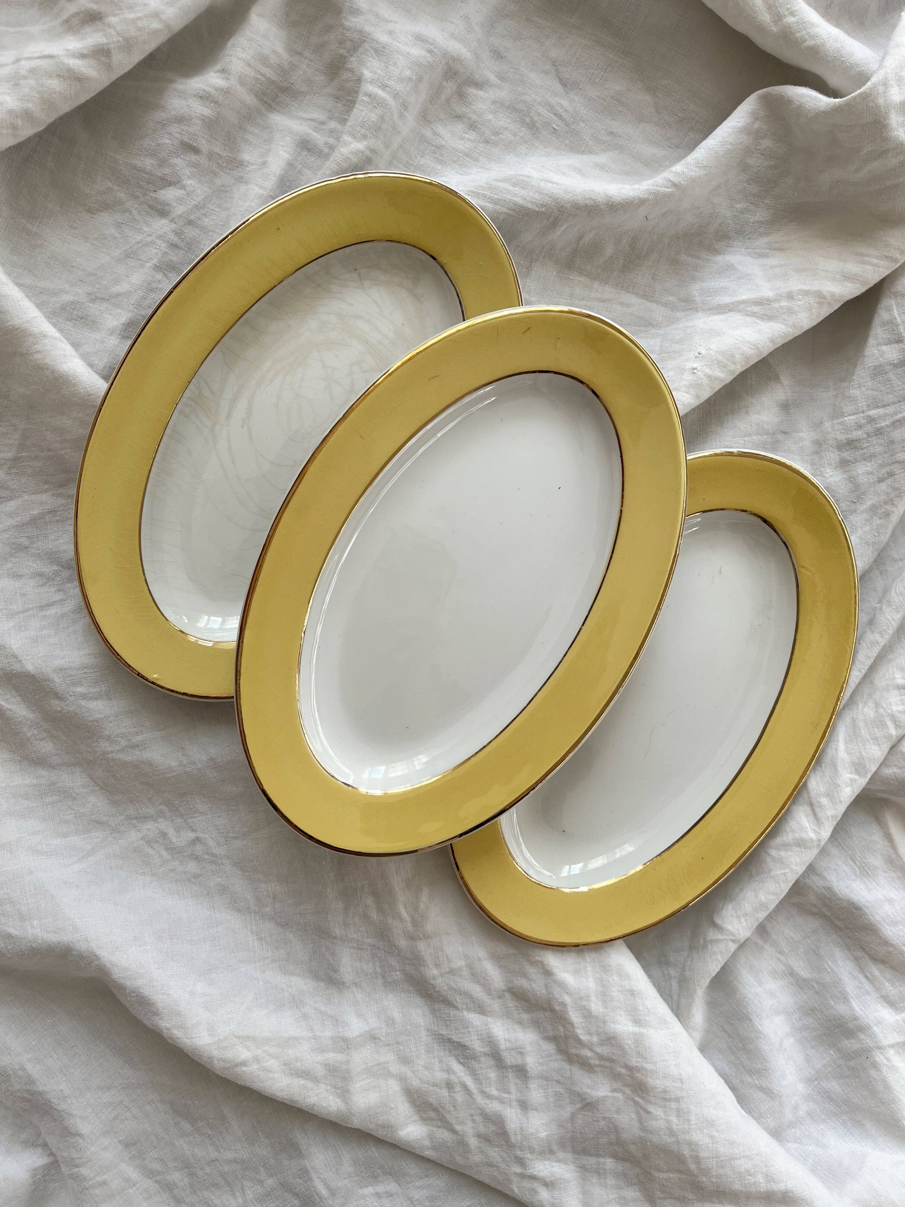 3 vintage yellow earthenware dishes with gold trim L'amandinoise