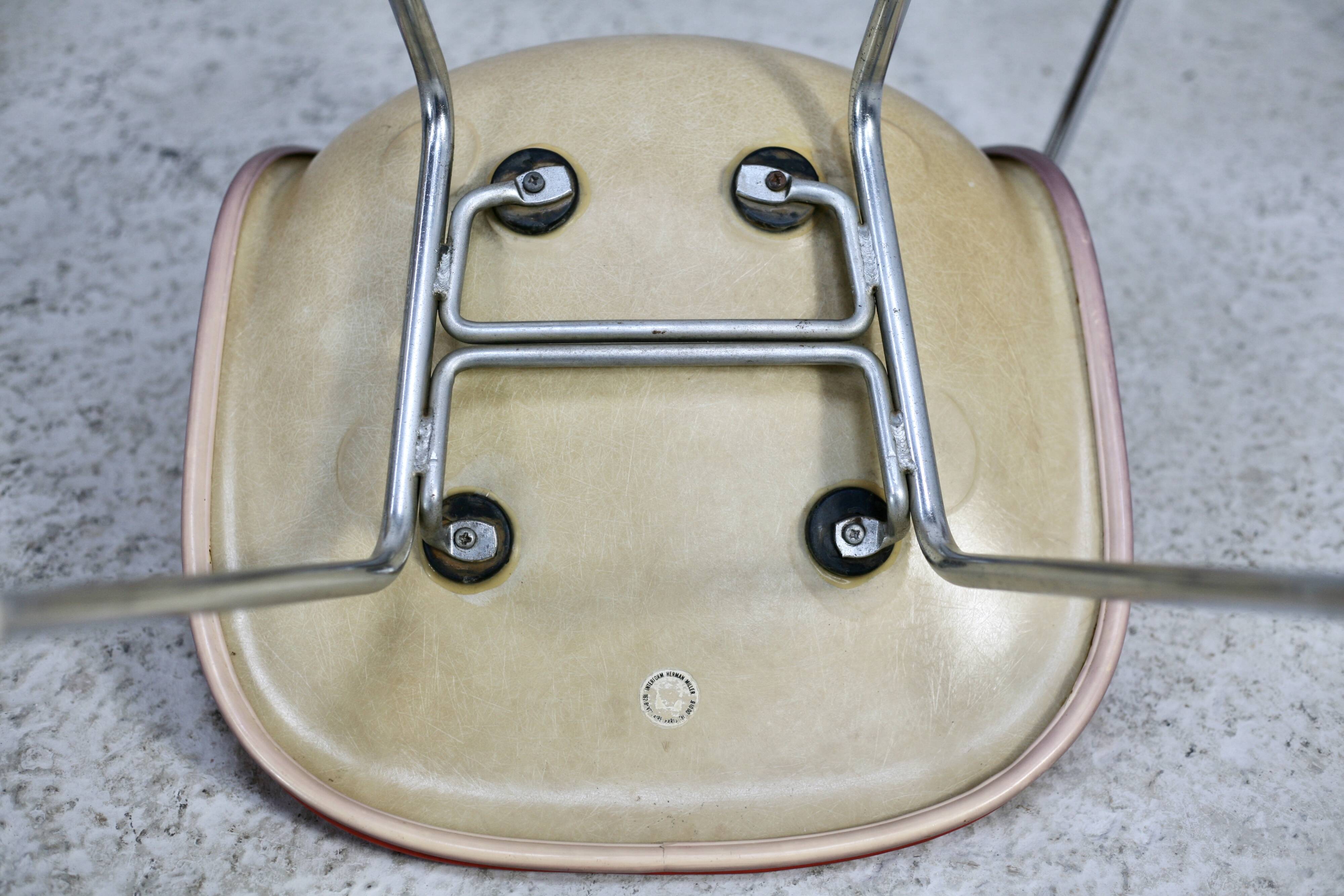 Ray & Charles Eames, Herman Miller edition, set of 4 orange chairs. Circa 1960