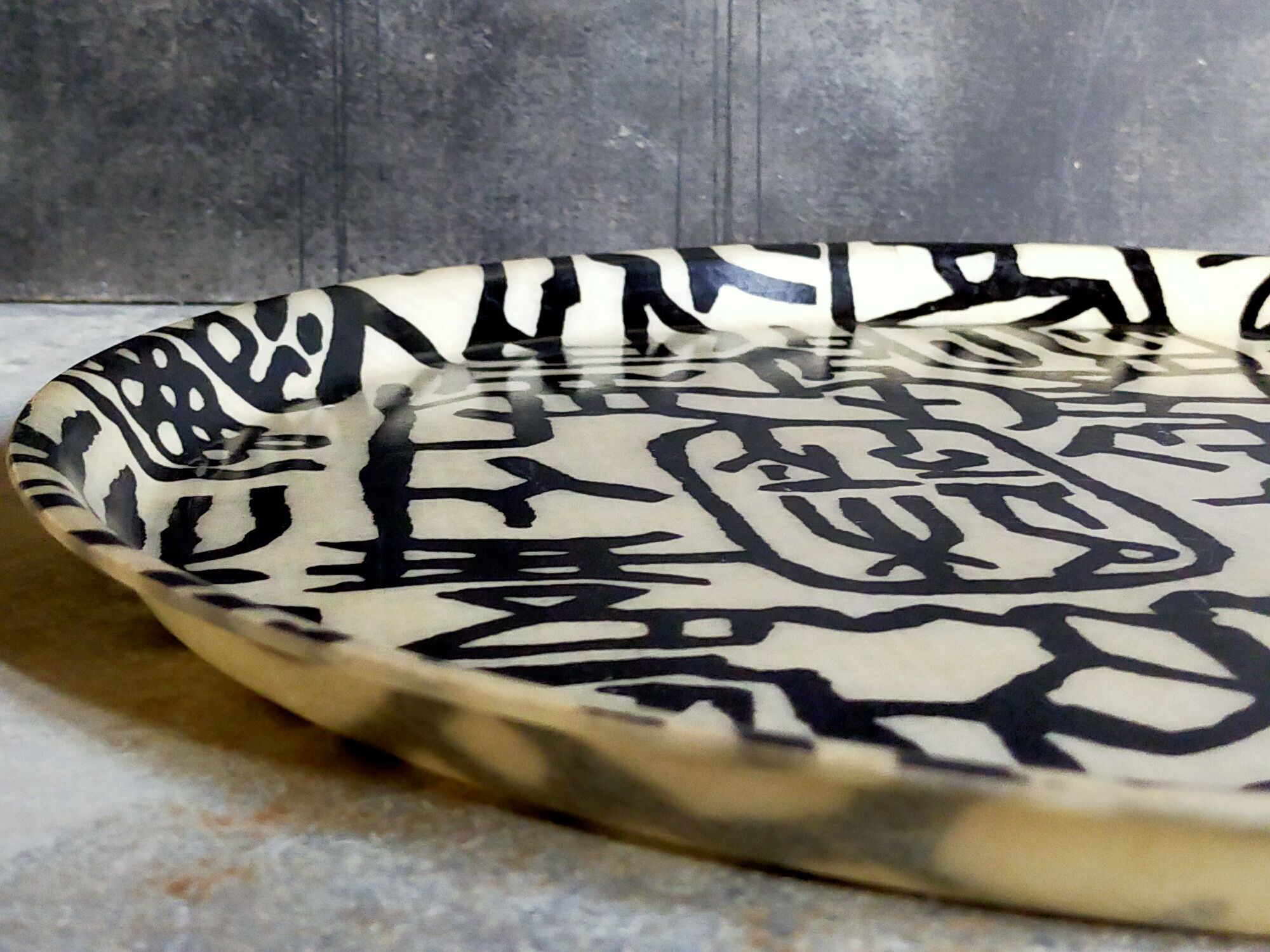 Vintage fiberglass tray with graphic patterns