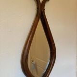 Mirror with fish-shaped wooden frame