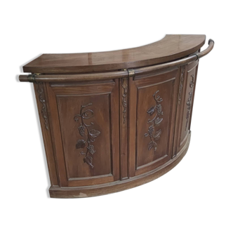 Walnut quarter-circle bar counter dating from the 50s/60s