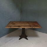 Old table on cast iron machine leg