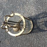 Suspension in glass and brass