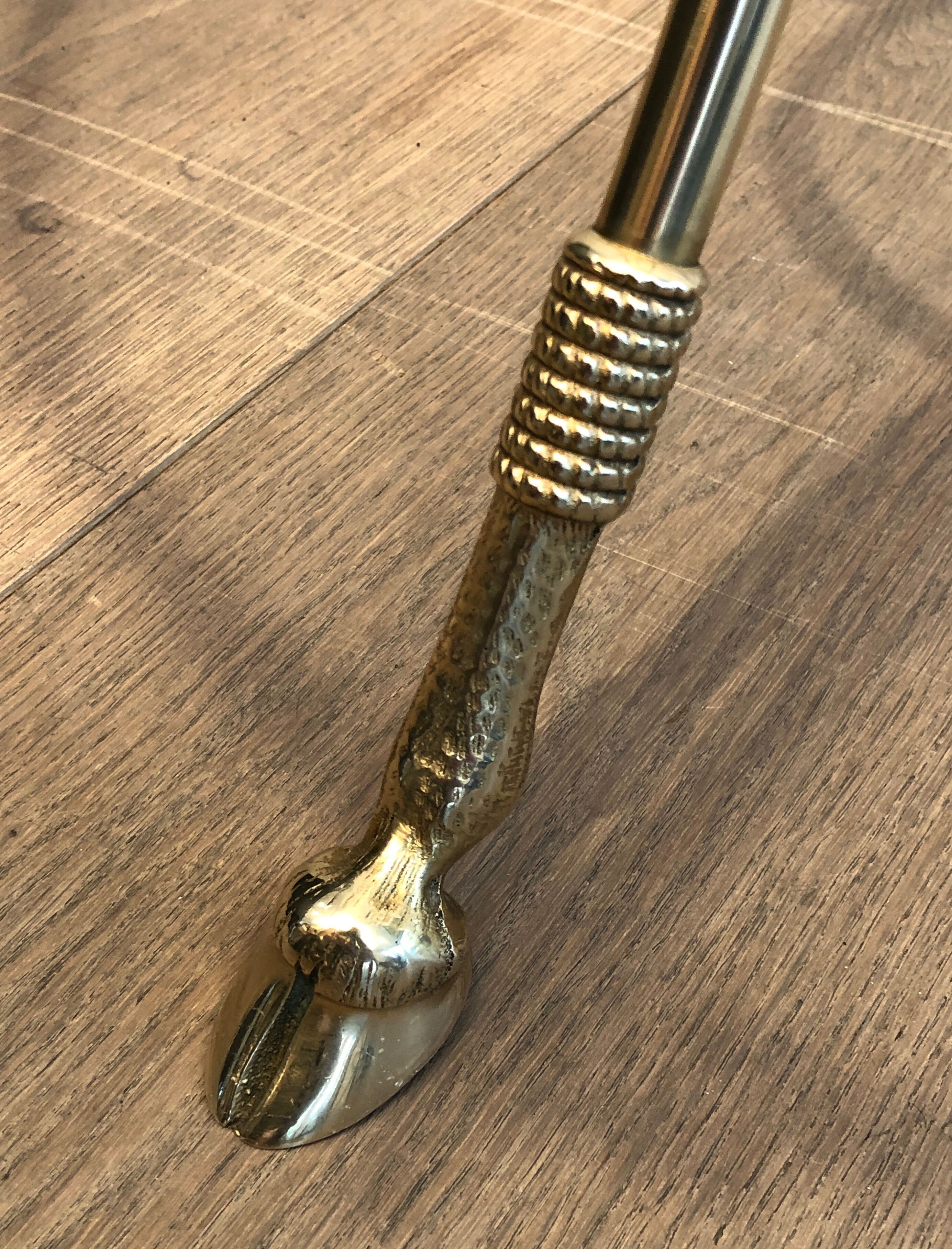 Neoclassical style tripod pedestal table in brass and round glass top in the taste of the House