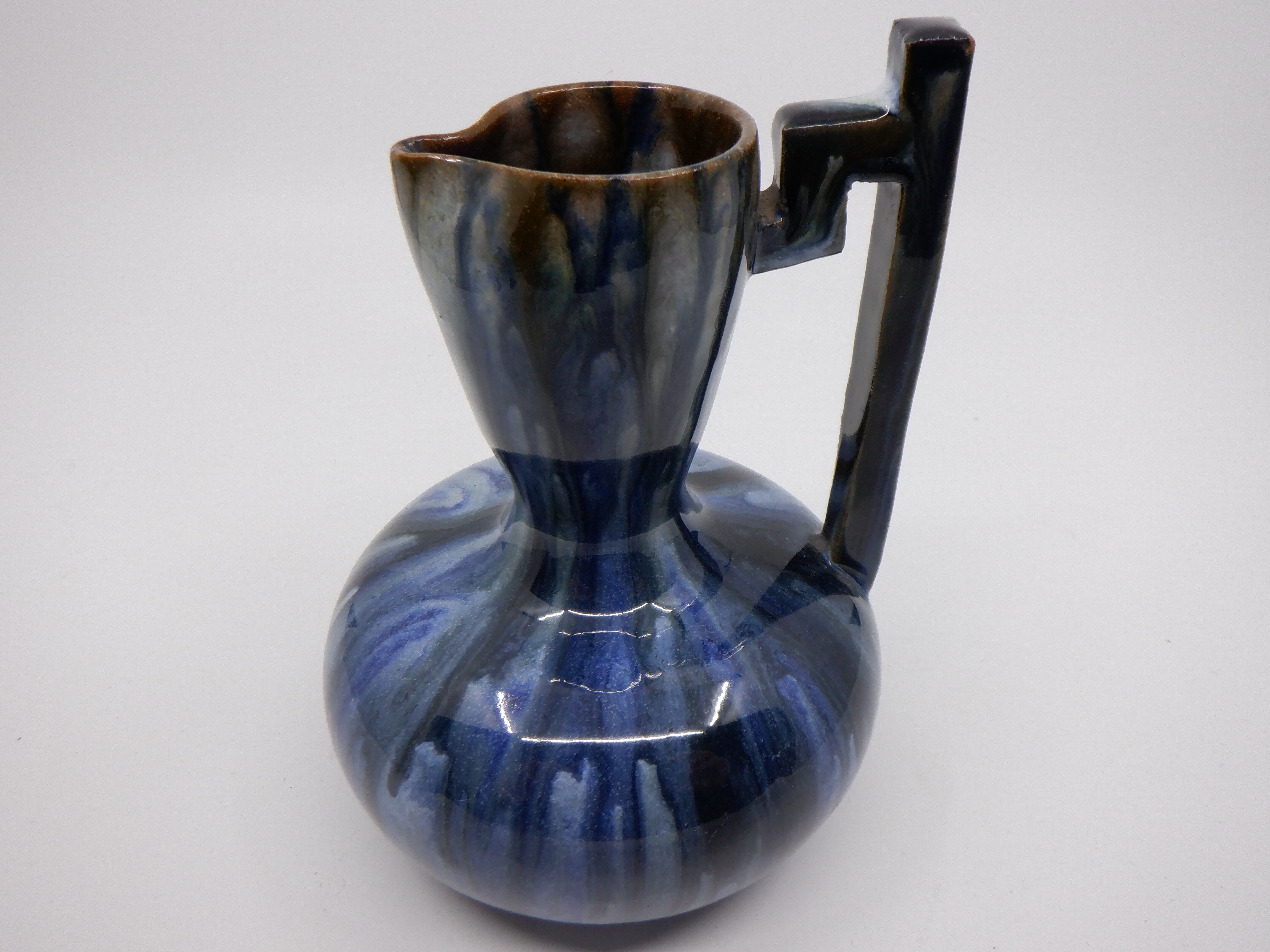 Blue ceramic pitcher