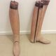 Old wooden shoe trees and their vintage leather rider boots. 1950
