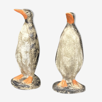 Pair of concrete penguins