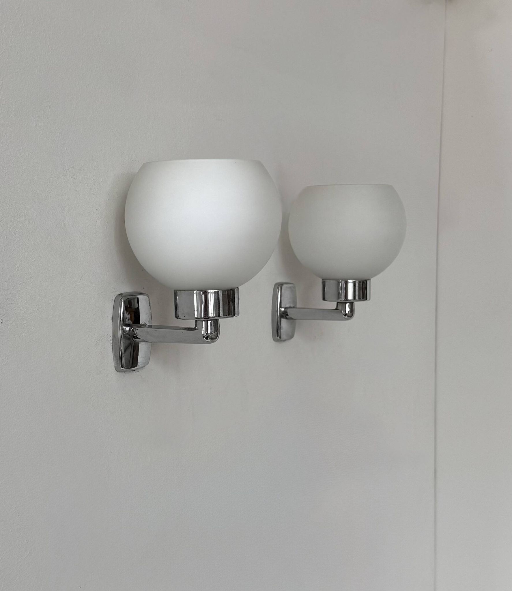 Pair of vintage wall lights, chrome and opaline glass, France, 1970