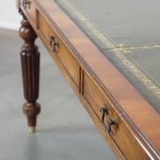 Large writing desk with green leather top, elegant legs and 3 English style drawers