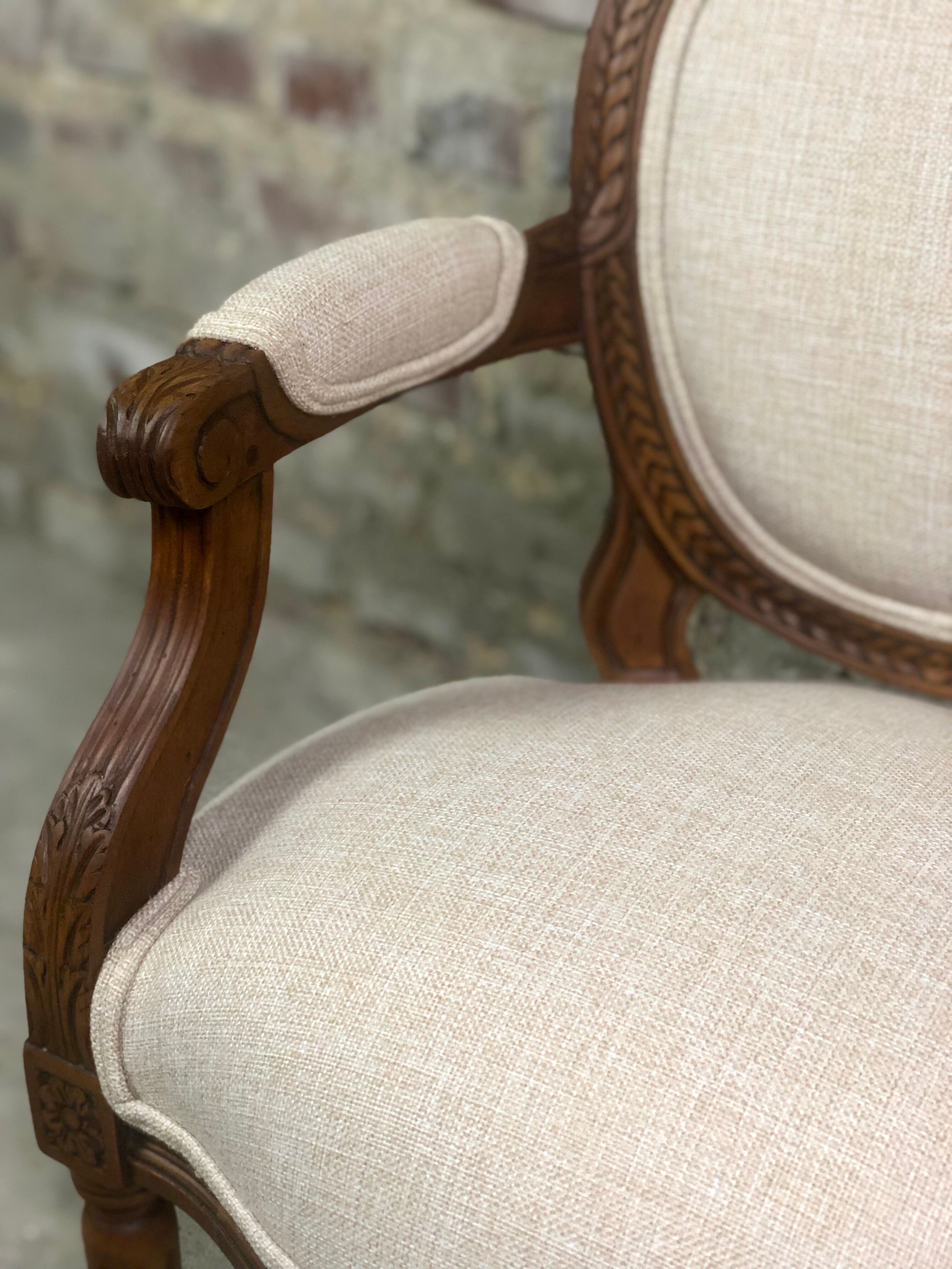 Louis XVI style children's armchair in carved walnut and beige antique upholstery