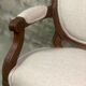 Louis XVI style children's armchair in carved walnut and beige antique upholstery