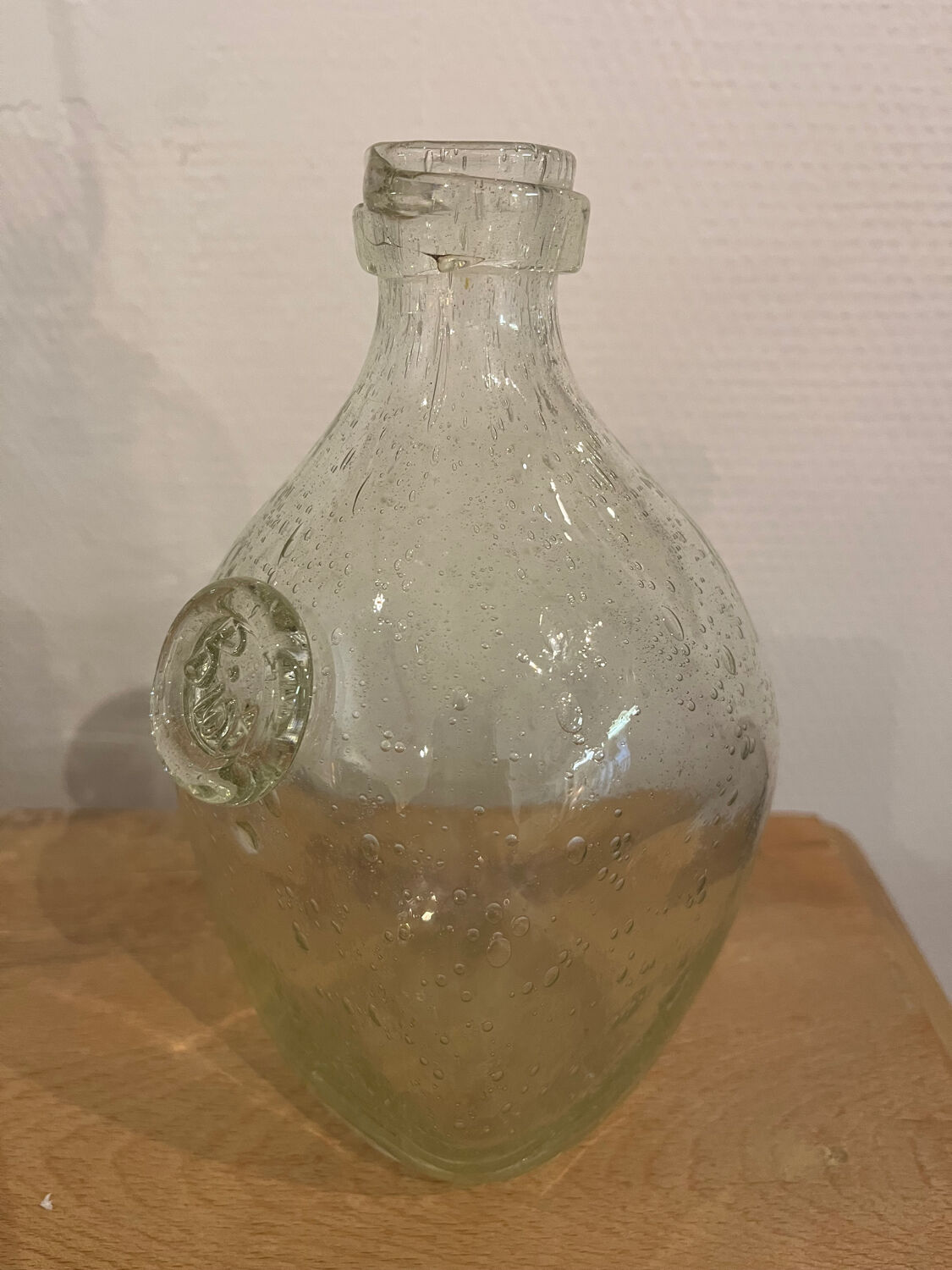 Signed Biot bubble glass bottle