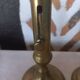 Pair of brass push-button candlesticks