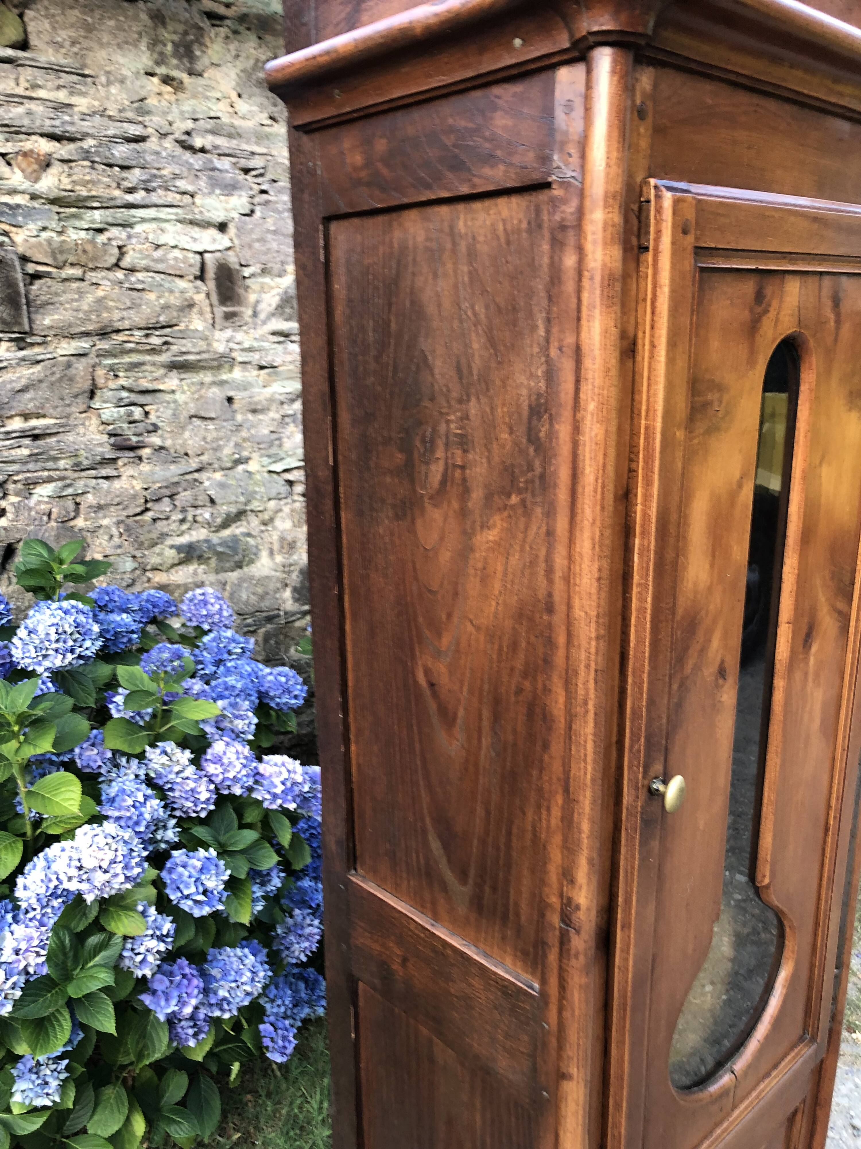 Comtoise clock in cherry style Louis XV period 19th region Fougères.