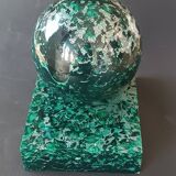 Design bookends in fractal resin with watchmaking inclusions.