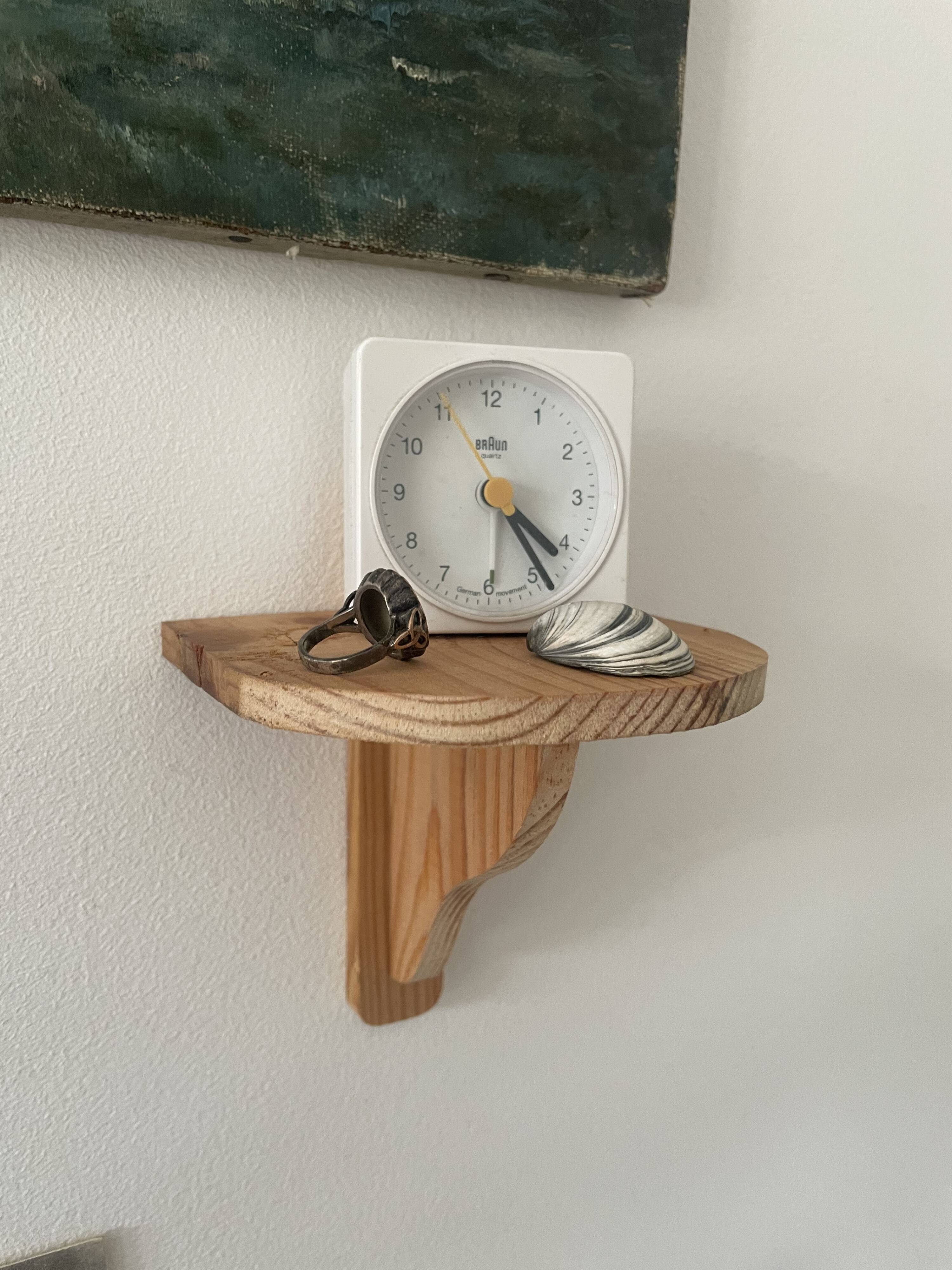 Small wooden wall shelf
