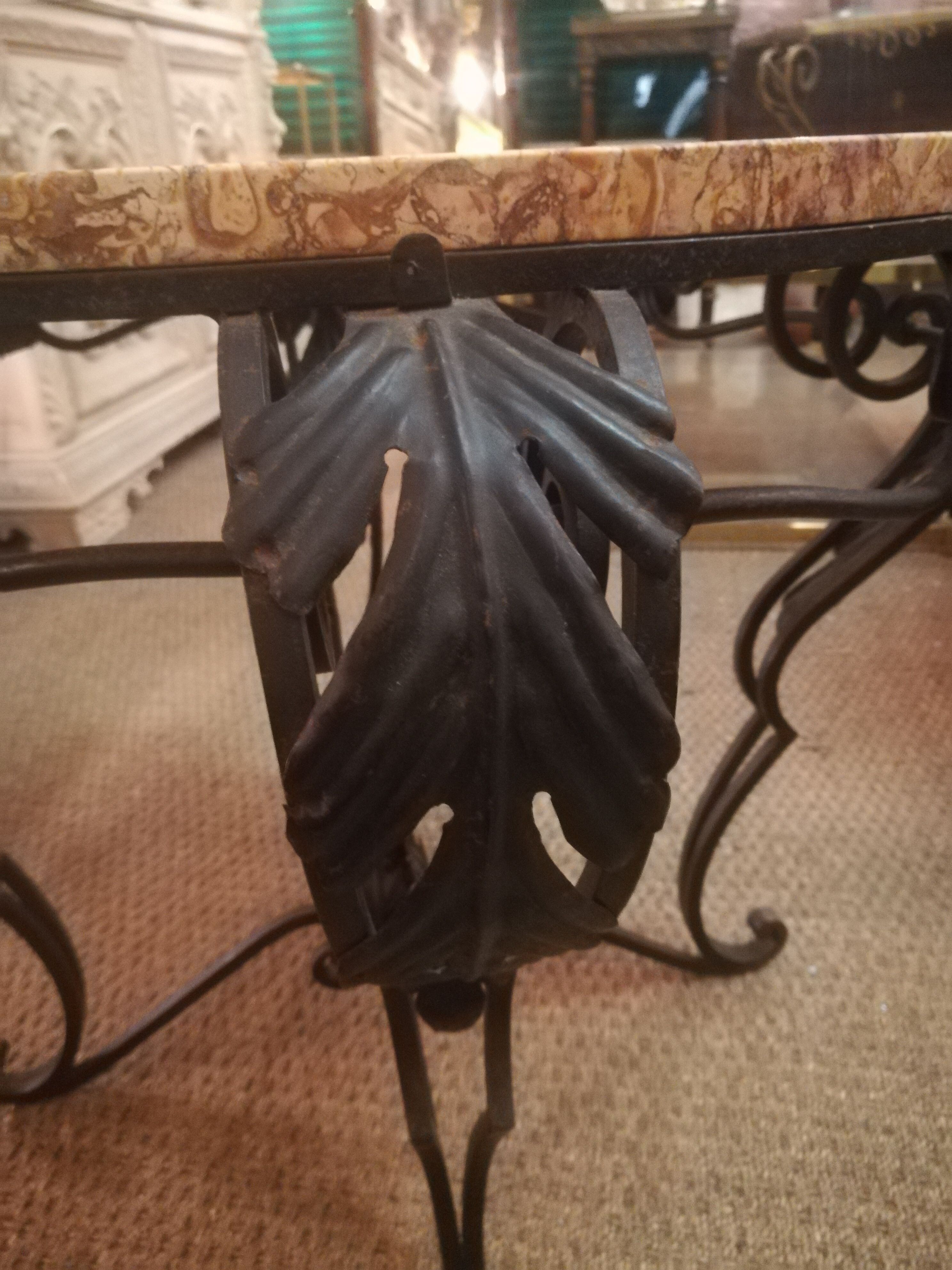 Wrought iron and marble coffee table