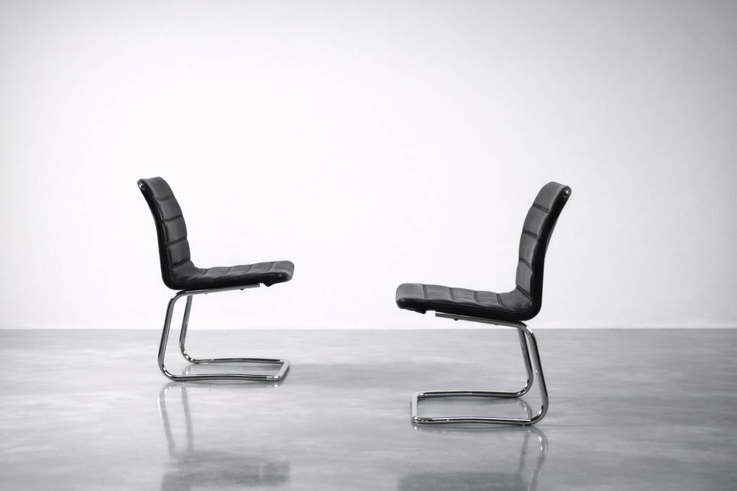 Vintage Mid-Century Minimalist Chrome and Black Leather Club Chairs
