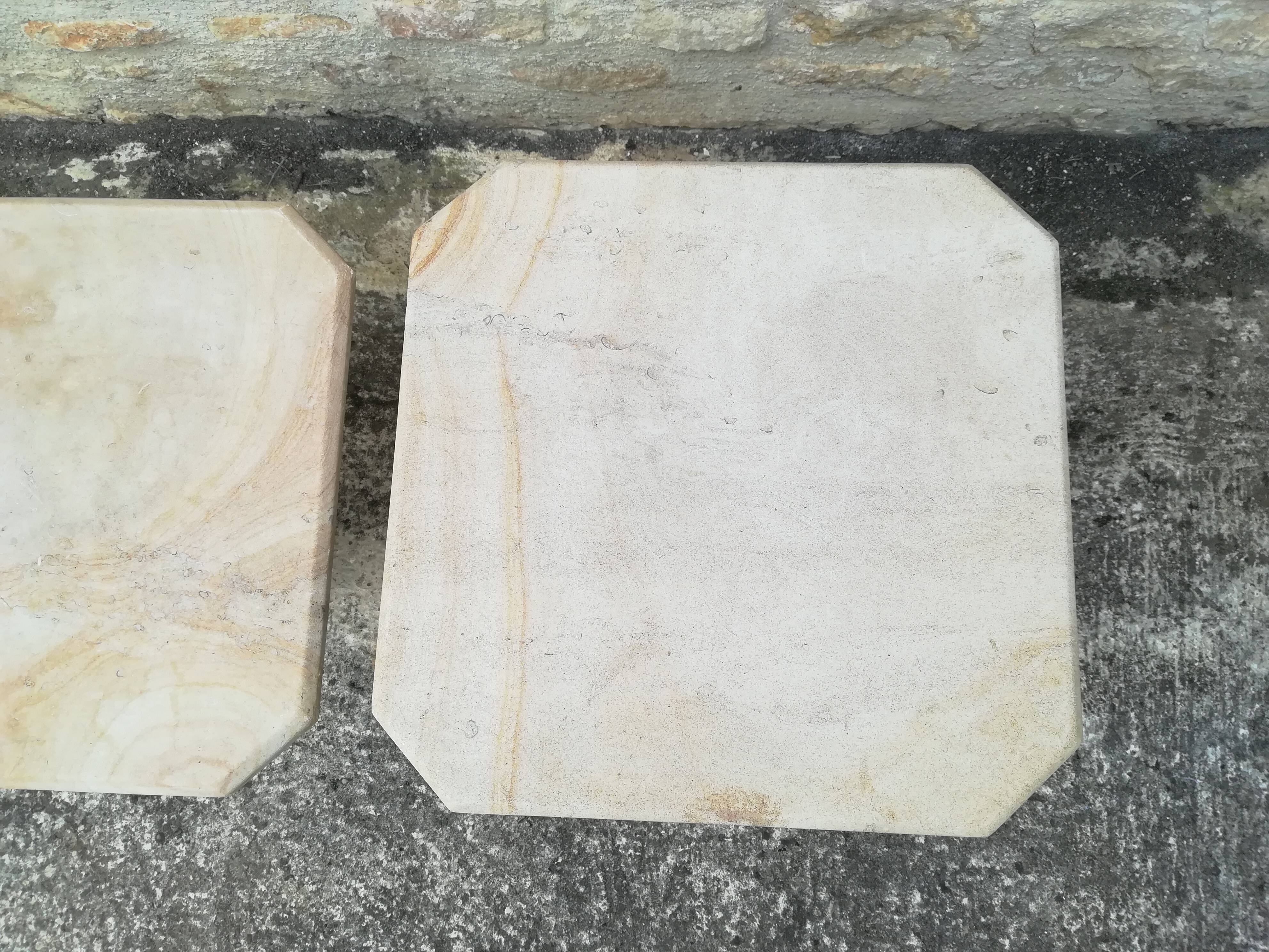 Nesting coffee tables in natural travertine