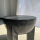 Black mango wood tripod side table with a semi-spherical top, height: 45 cm, diameter: 44 cm.