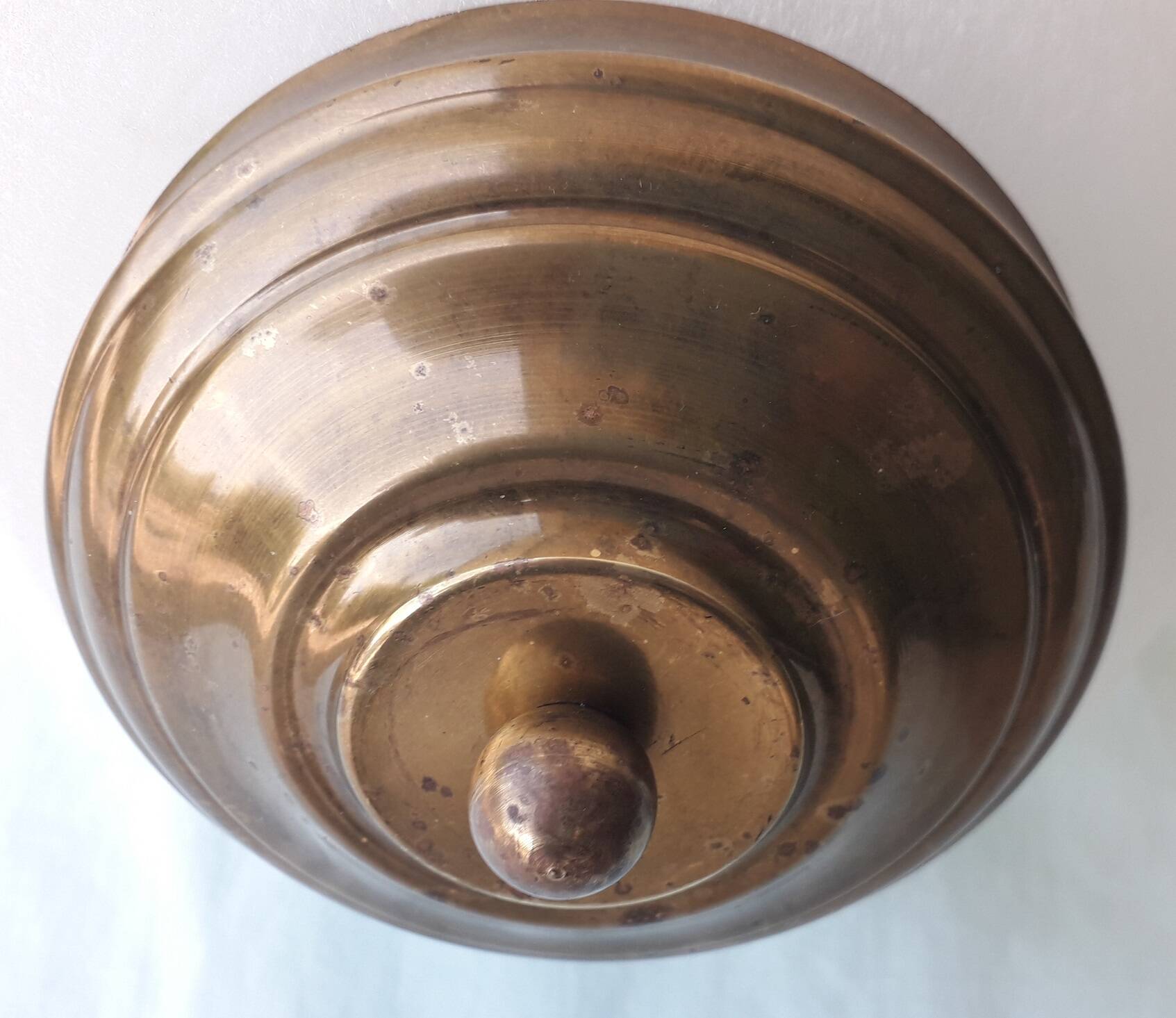 Glass and brass suspension