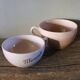 A set of 3 pink earthenware cups from Digoin Sarreguemines.