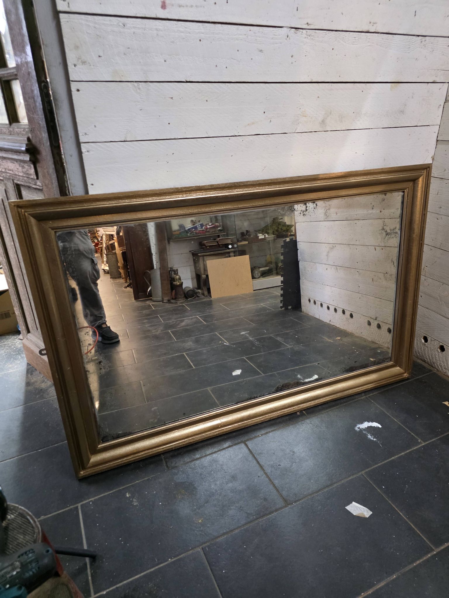 Golden mirror in oak from the 19th century.