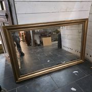Golden mirror in oak from the 19th century.