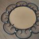 Miroir en fer forgé et bagues métal doré vers 1950 - 39cm