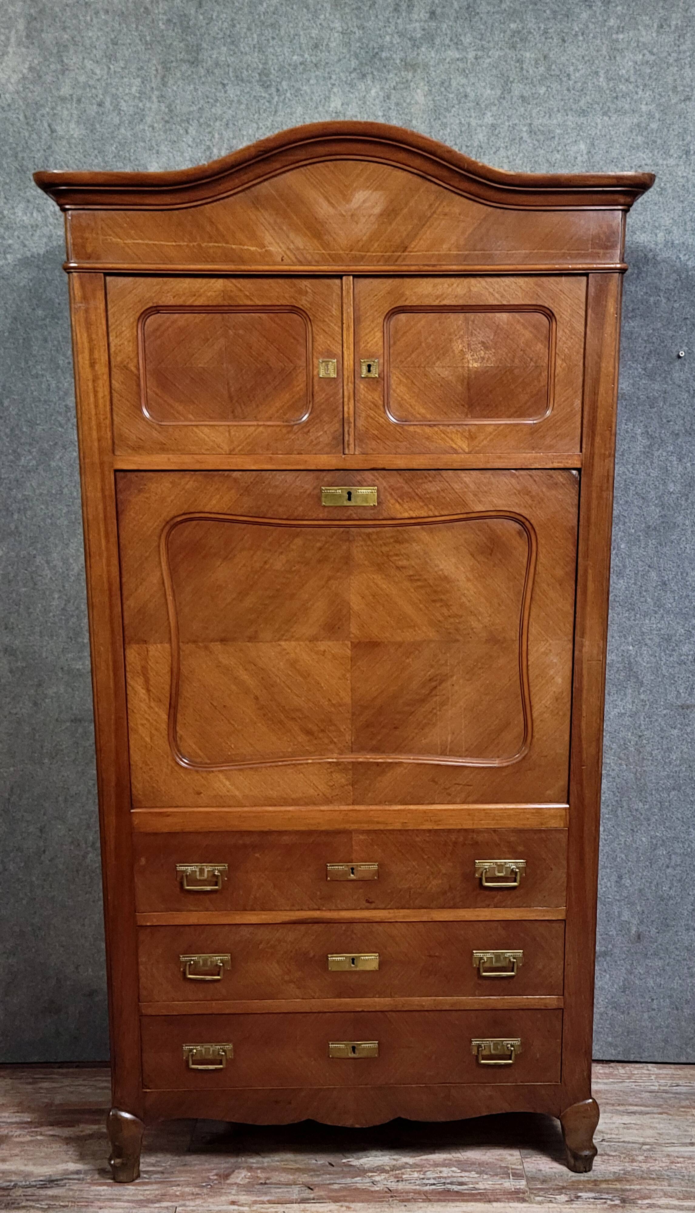 Rare Biedermeier guillotine secretary, made of walnut and marquetry.