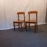 pair of solid pine chairs by Rainer Daumiller