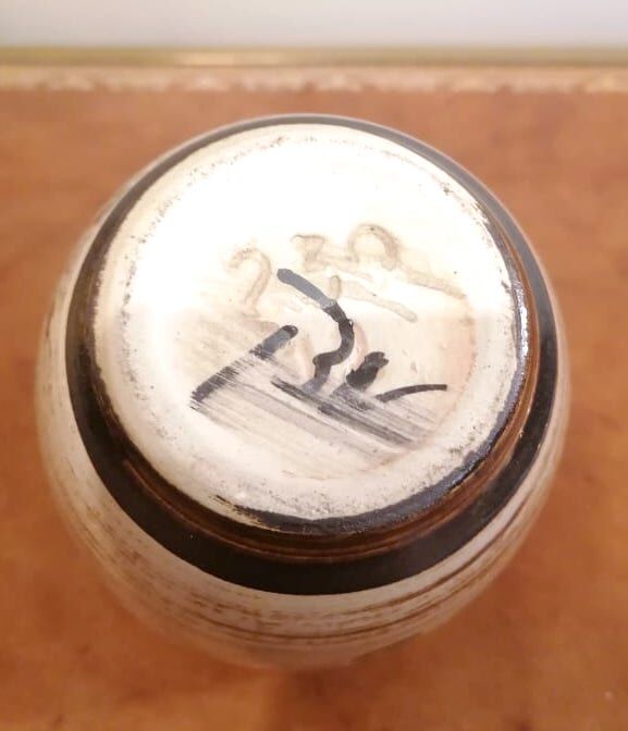 Vintage ceramic vase with flowers