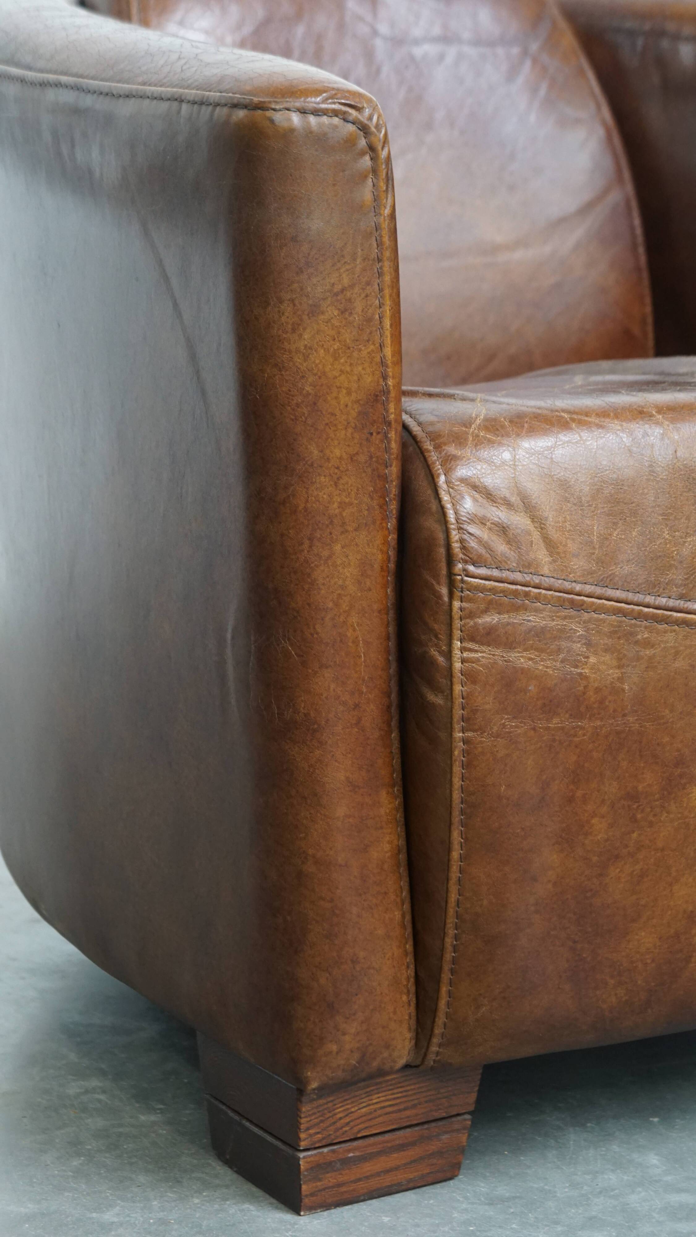 Brown Aviator design armchair made of cowhide leather