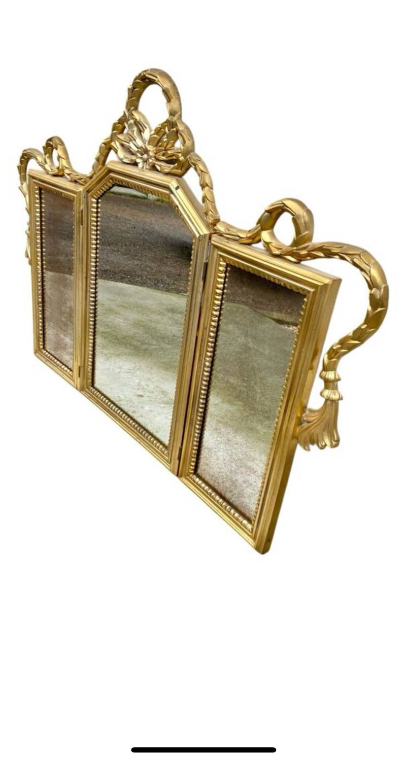 Miroir triptyque en bois doré et sculpté