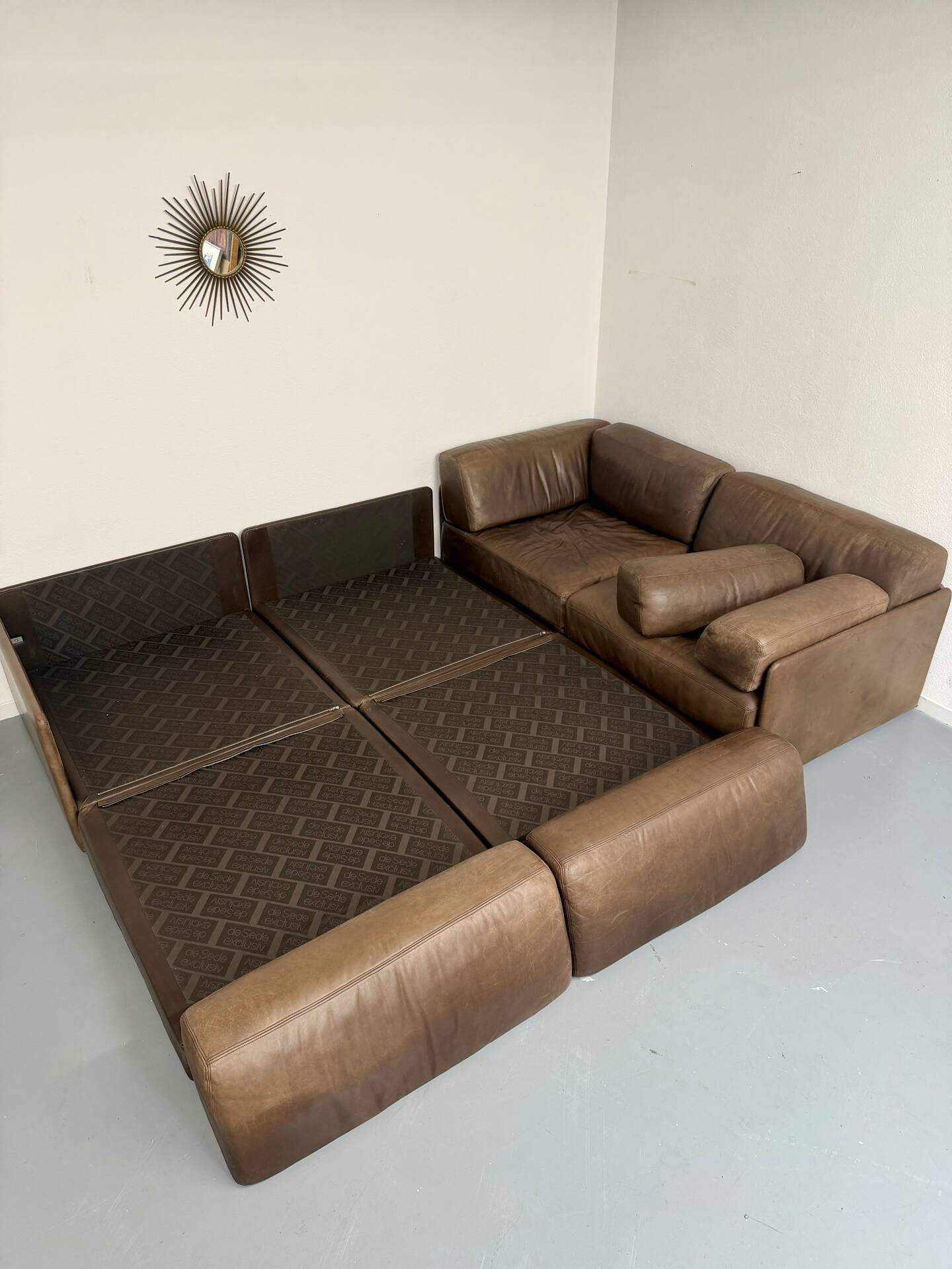 Modular corner sofa DS-76 in brown leather, designed by De Sede, 1980s.