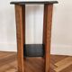 Art Deco console with sculpted black lacquered legs.