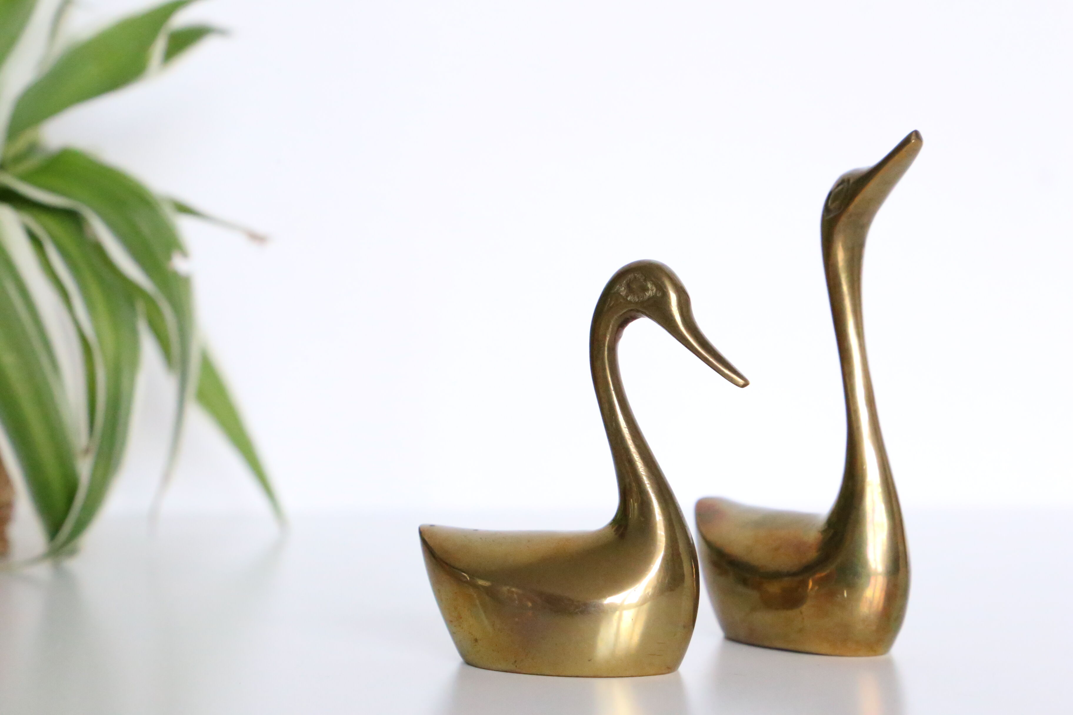 Brass goose duo, vintage paper press