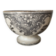 Old bowl made of iron with ceramic seams.