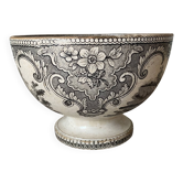 Old bowl made of iron with ceramic seams.