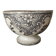 Old bowl made of iron with ceramic seams.