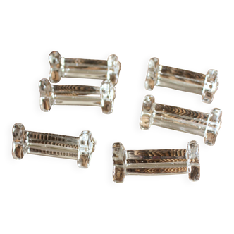 A set of 6 transparent trilobite glass knife rests.