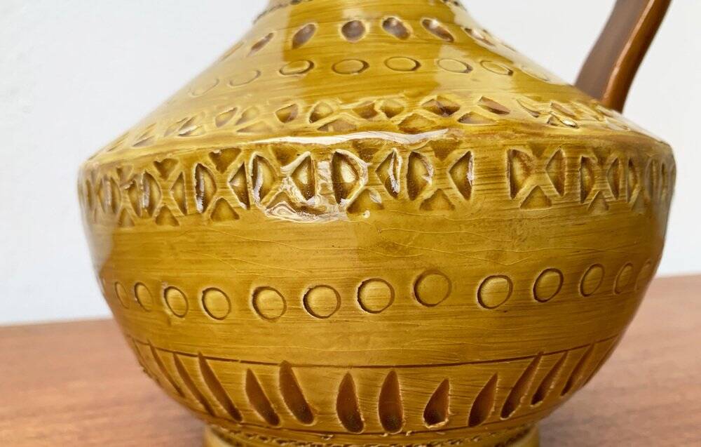 Italian pottery carafe from the mid-century by Aldo Londi for Bitossi, 1960s.