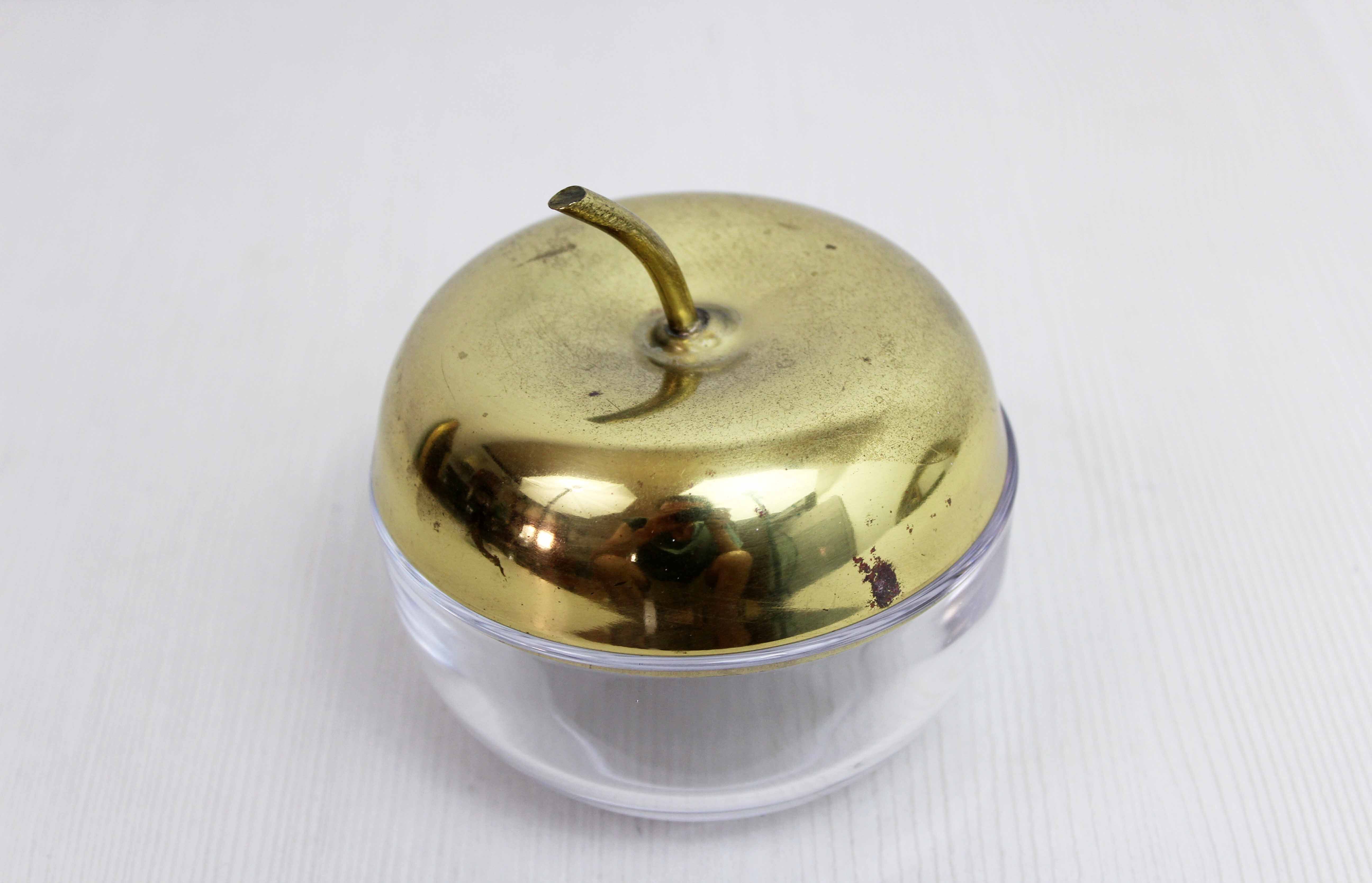 Glass and brass apple sweetener