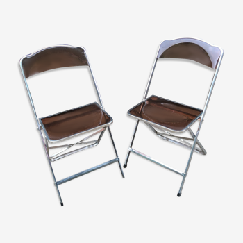 Transparent folding chairs pair