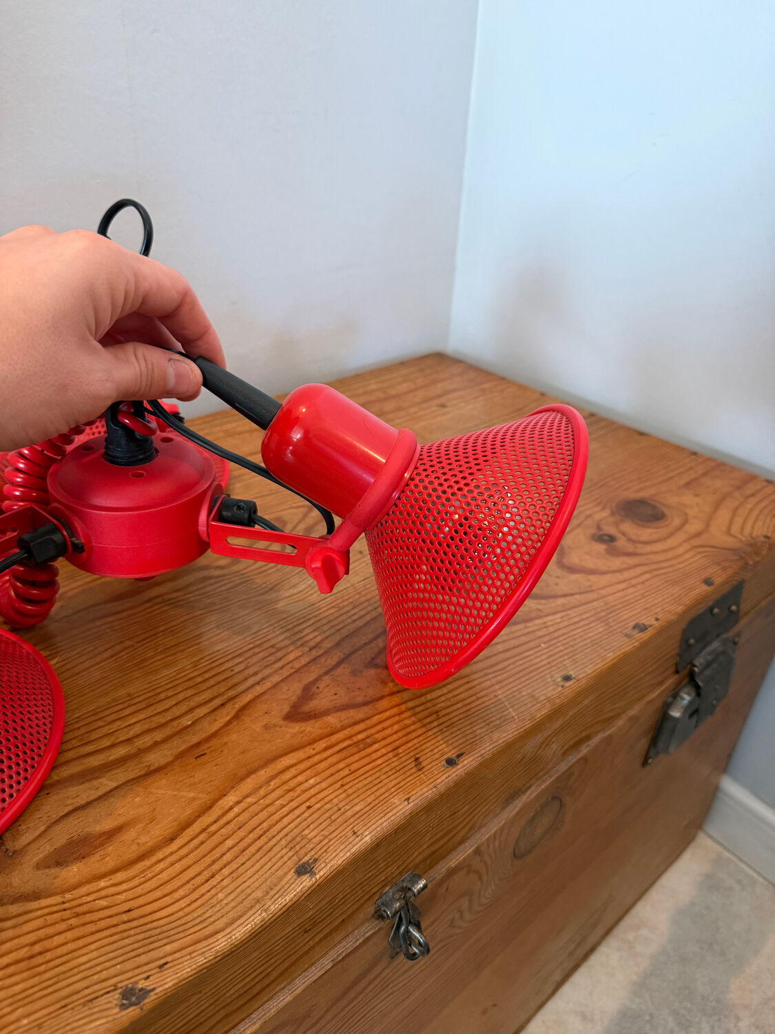Three-lamp suspension in Memphis design style in red metal.