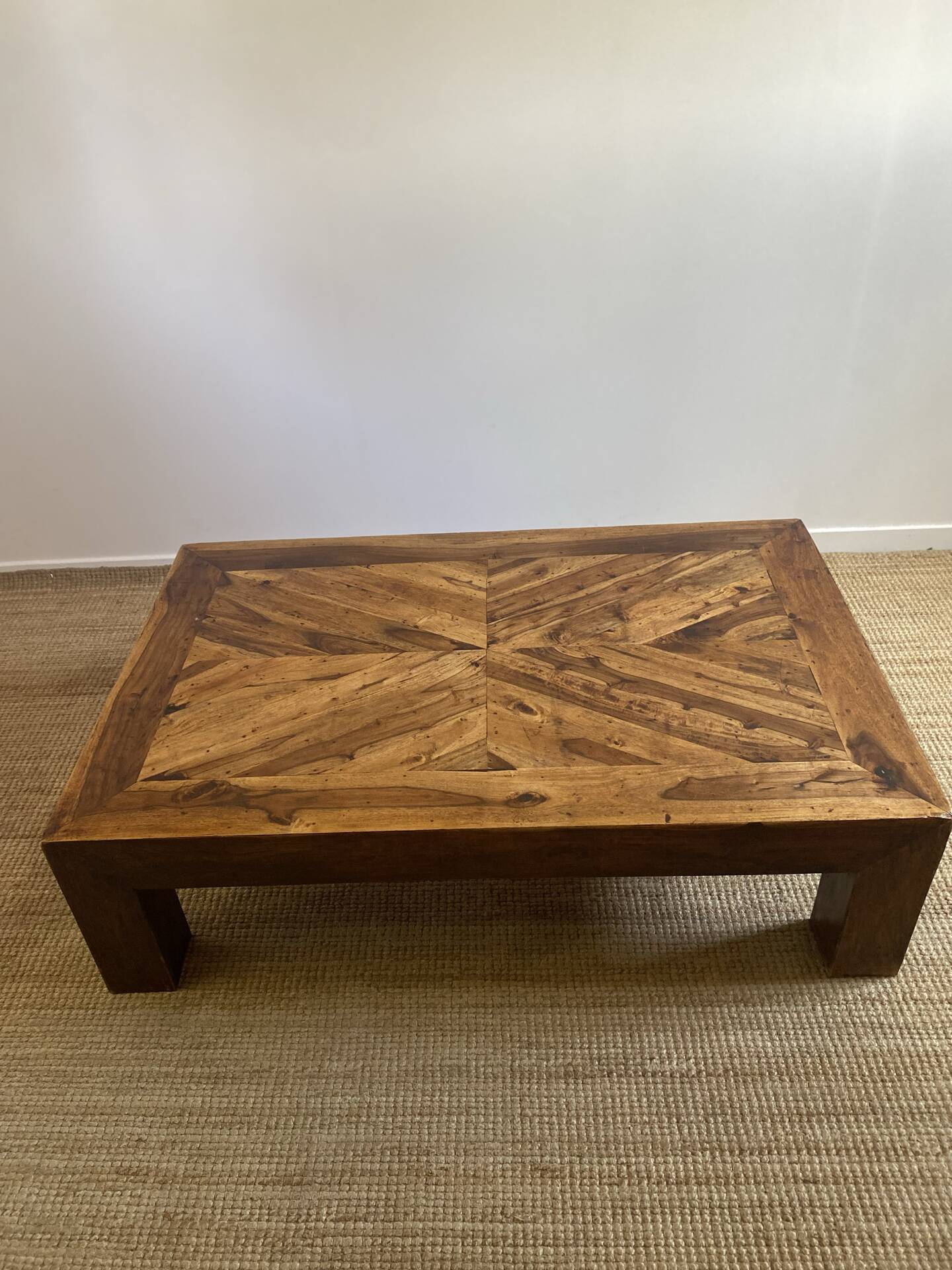 Solid wood coffee table with marquetry top